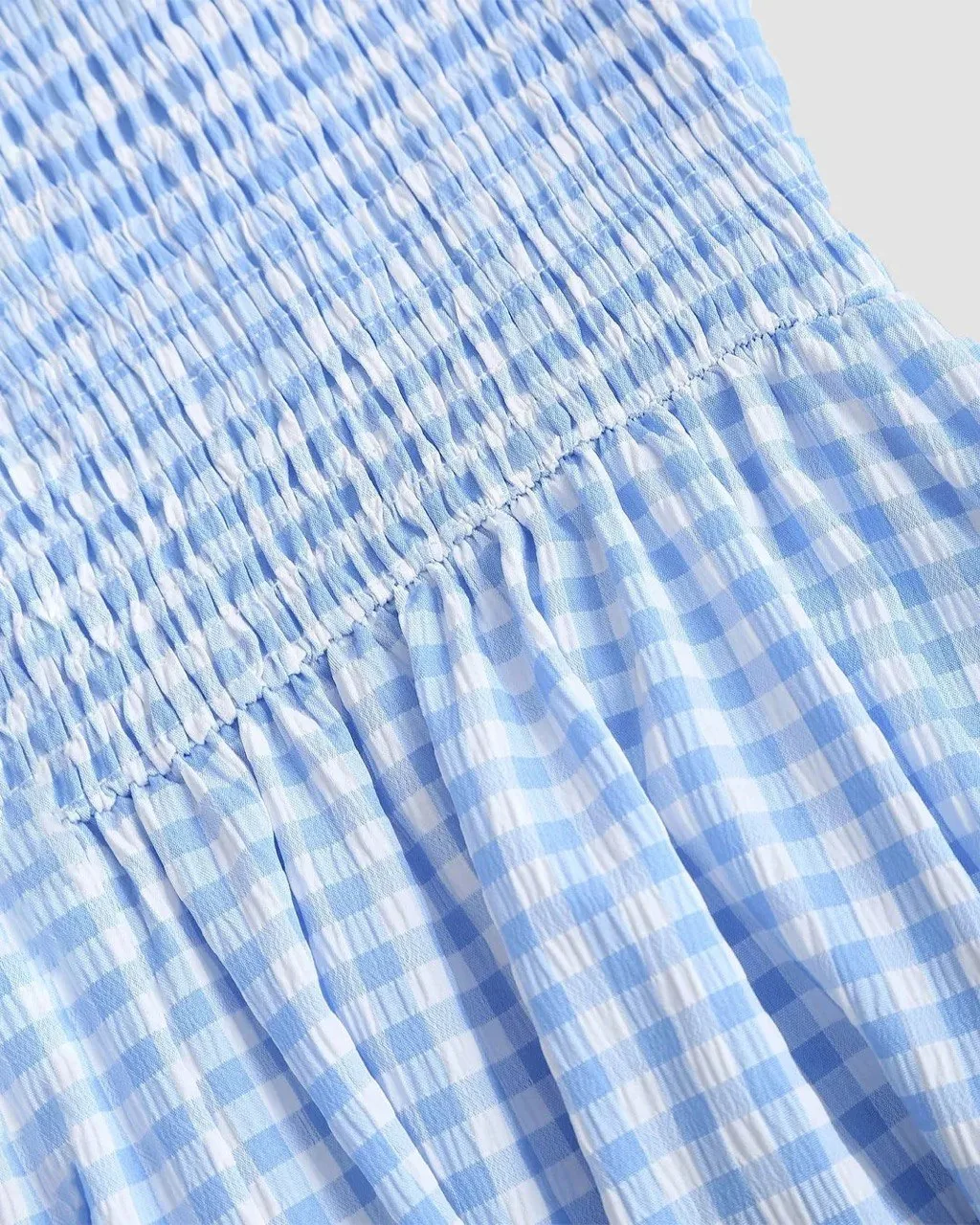 Blue gingham smocked bodice detail